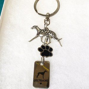 2/30$ NWT Greyhound keychain
